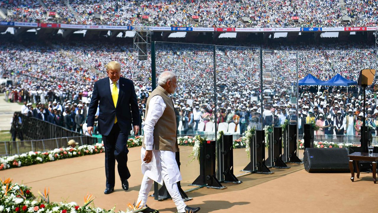 125,000 people turned out to see Donald Trump (left) open the Narendra Modi Stadium in 2020. (Photo by Mandel NGAN / AFP)