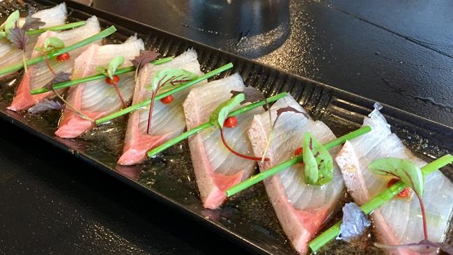 Kingfish carpaccio at Sankaku Izakaya. Picture: Beverley Hudec.