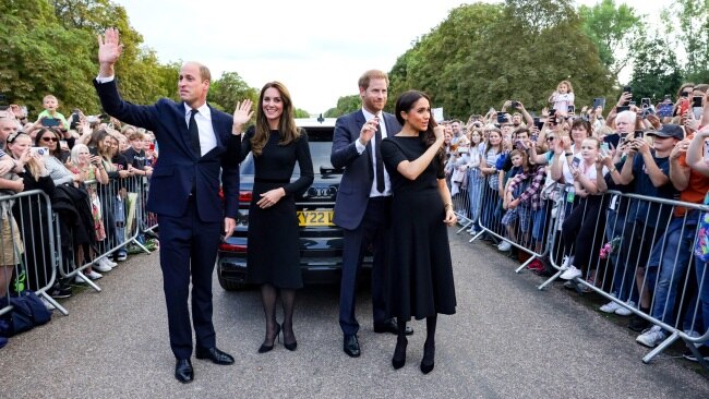 Catherine, Princess of Wales, Prince William, Prince of Wales, Prince Harry, Duke of Sussex, and Meghan, Duchess of Sussex wave to the crowd at Windsor Castle. Picture: Chris Jackson - WPA Pool/Getty Images.