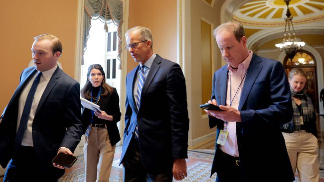 US Senate Majority Leader John Thune is trailed by reporters as negotiations continue over funding to avert a government shutdown. Picture: Anna Moneymaker/Getty Images/AFP