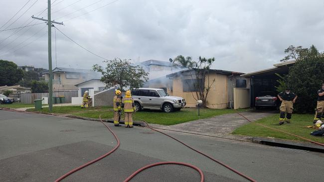 Emergency services rushed to a fire on Nevenia St, Labrador on March 25. The home was destroyed in the inferno, which police believe may have been sparked by a lithium ion battery in an e-bike. Picture: Alex Treacy.