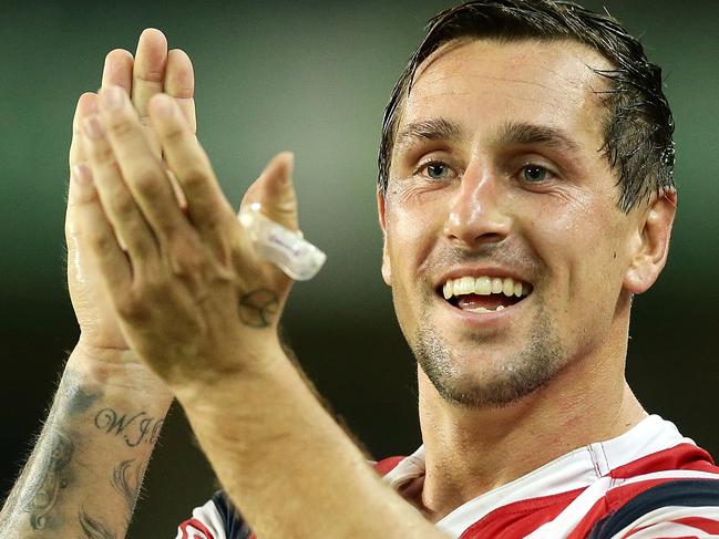 SYDNEY, AUSTRALIA - APRIL 30:  Mitchell Pearce of the Roosters celebrates a try from the bench during the round nine NRL match between the Sydney Roosters and the Newcastle Knights at Allianz Stadium on April 30, 2016 in Sydney, Australia.  (Photo by Mark Metcalfe/Getty Images)