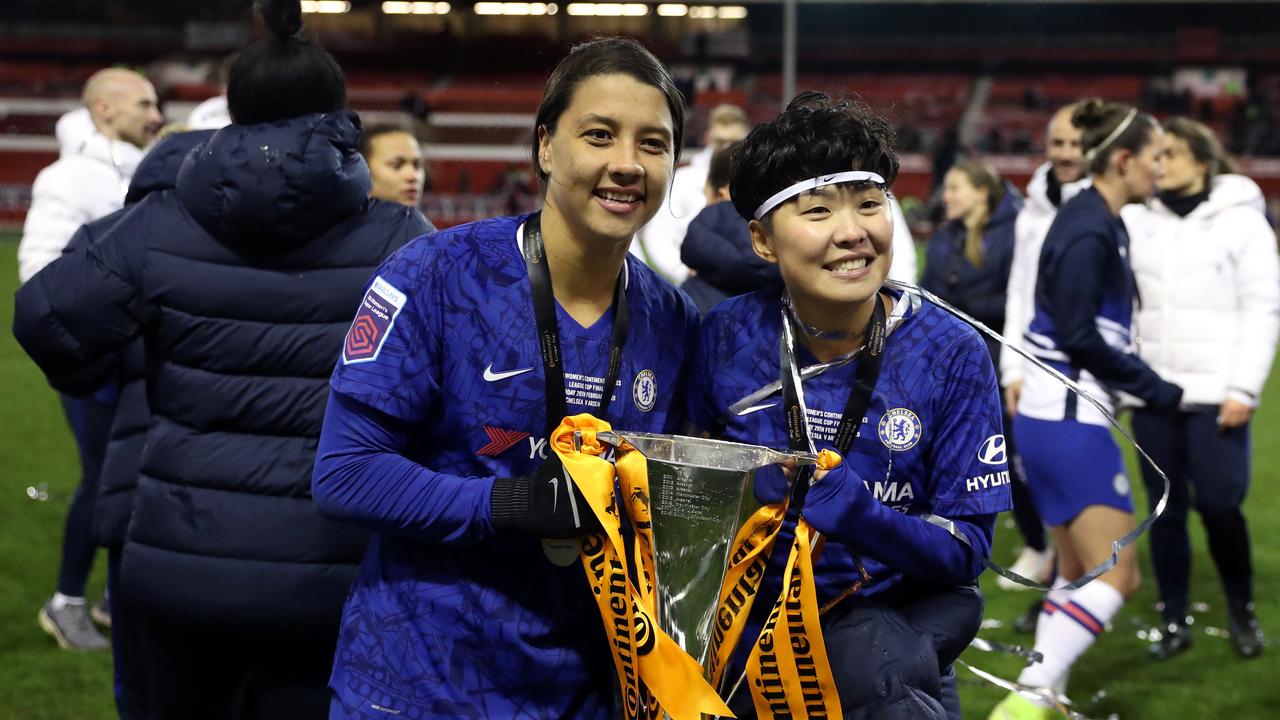 Sam Kerr celebrates with the trophy following the FA Women's Continental League Cup Final