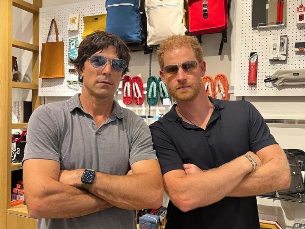 Prince Harry hams it up with good friend Nachos Figueras in Tokyo. Picture: nachofigueros