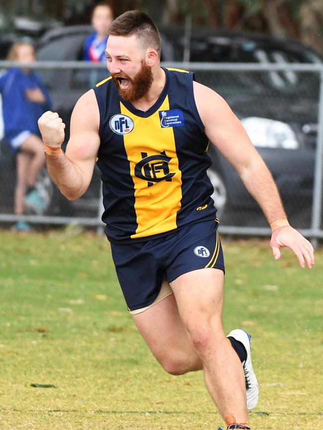 Hurstbridge’s Troy Barbero celebrates a goal earlier this year. Picture: James Ross.