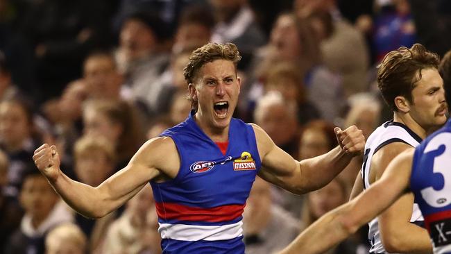 Aaron Naughton celebrates one of the Dogs’ five final-term goals. Pic: Getty Images