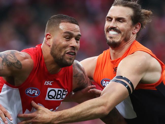 Sydney's Lance Franklin and  Giants Phil Davis during AFL Elimination Final between the Sydney Swans and GWS Giants at the SCG. Picture. Phil Hillyard