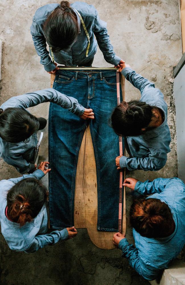 Workers at one of two of Outland Denim’s Cambodian factories. Picture: James Giles