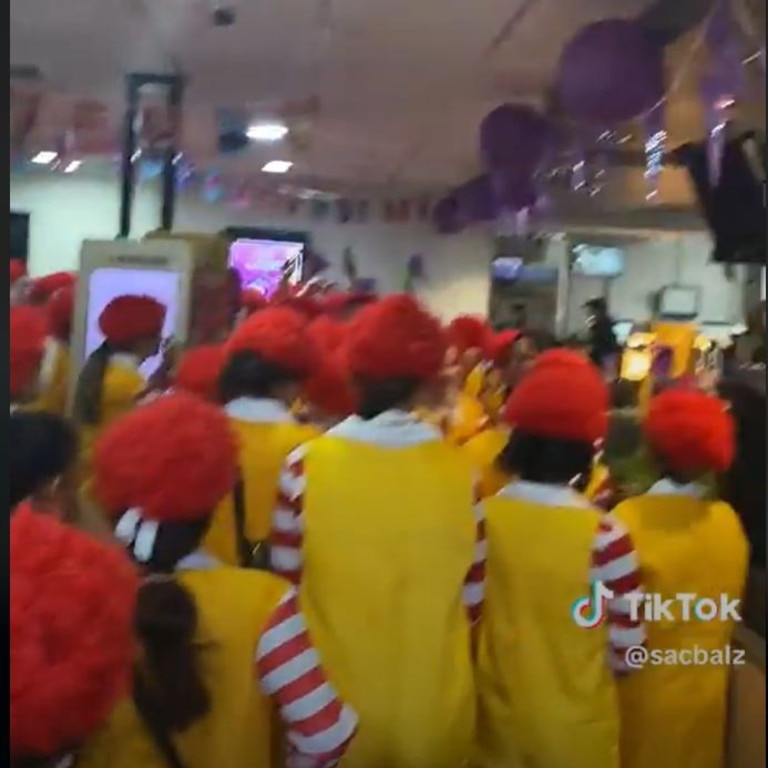 Dozens of Sacre Coeur students dressed as Ronald McDonald inside the store.