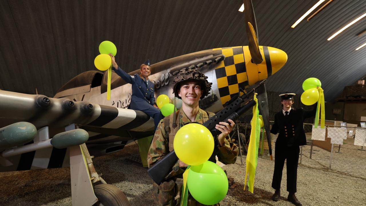 Staff members Balin Biddle, Alicia Withers and Daniel Brodie all dressed up for the Gold Coast War Museum 50th anniversary this Saturday at Mudgeeraba. Picture Glenn Hampson.