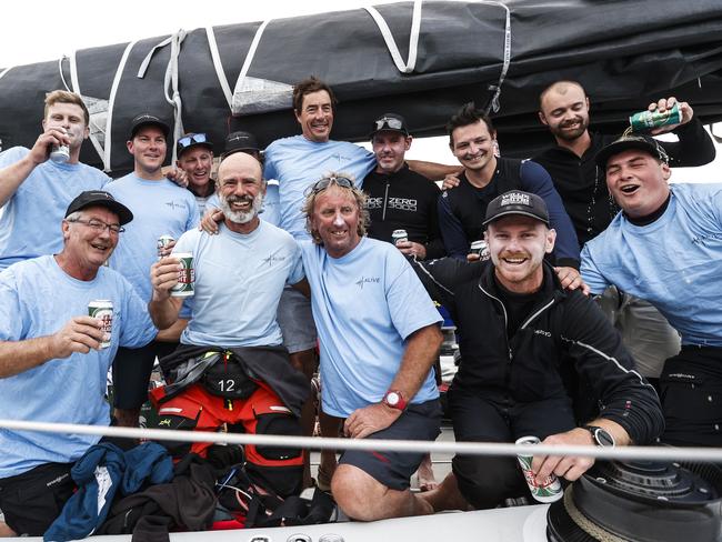 Alive skipper Duncan Hine with his crew as Alive claimed line honours in the 2020 Launceston to Hobart yacht race. Picture: Zak Simmonds