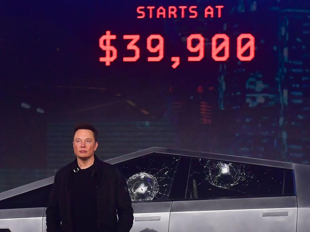 Tesla co-founder and CEO Elon Musk stands in front of the newly unveiled all-electric battery-powered Tesla's Cybertruck at Tesla Design Centre. Picture: AFP