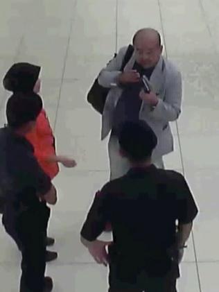 Kim Jong Nam talks to airport security and officials after he was attacked. He was dead just minutes later. Picture: AP