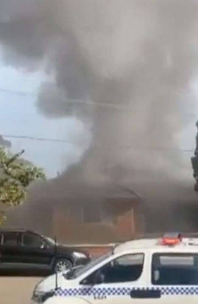 Smoke was seen billowing from the house when emergency services arrived. Picture: 9 NEWS