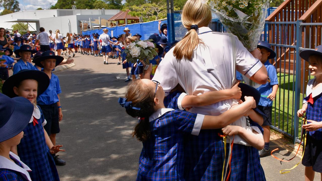 Suncoast Christian College farewells Year 12 students with a guard of honour across the campus.