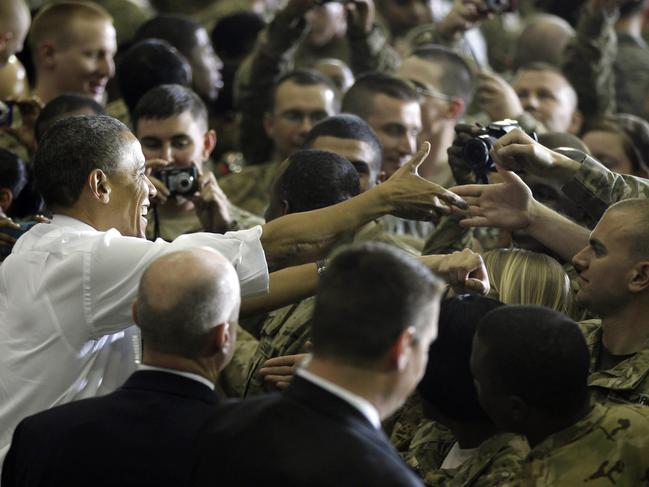 Obama greets troops in Afghanistan in 2012. Picture: AP