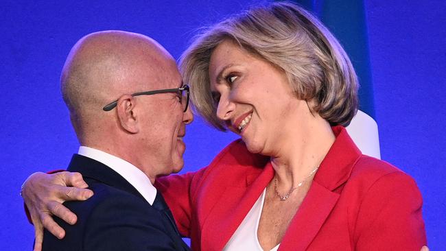 Valerie Pecresse embraces Eric Ciotti after after winning the primary in Paris on Saturday night. Picture: AFP