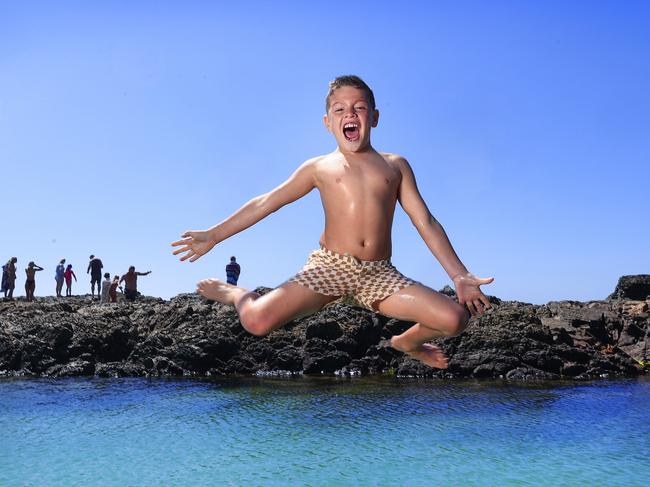 Harlo Ferguson, 7, of Sydney, enjoys school holidays at Snapper Rocks on the Gold Coast. Picture: Adam Head