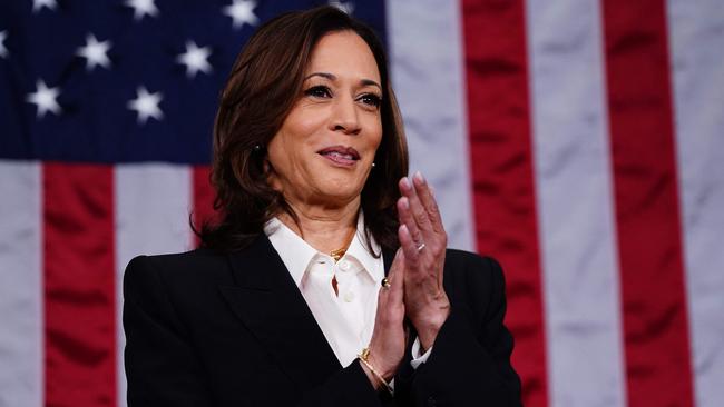 Vice President Kamala Harris stands in the House of Representatives ahead of US President Joe Biden's third State of the Union address to a joint session of Congress in the House Chamber of the US Capitol in Washington, DC, on March 7, 2024. (Photo by SHAWN THEW / POOL / AFP)