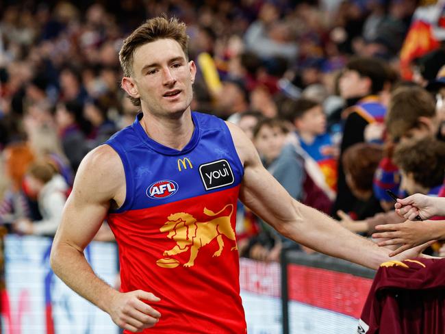 MELBOURNE, AUSTRALIA - JUNE 07: Harris Andrews of the Lions celebrates with fans during the 2024 AFL Round 13 match between the Western Bulldogs and the Brisbane Lions at Marvel Stadium on June 07, 2024 in Melbourne, Australia. (Photo by Dylan Burns/AFL Photos via Getty Images)