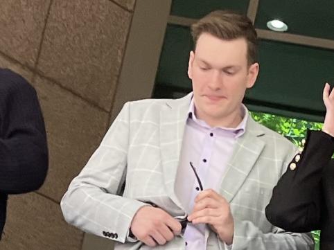 Darcy Hallford (centre left) leaving court with lawyers and his parents after a committal hearing in Melbourne Magistrates' Court after he was charged following a fatal crash at Park Orchards on 22 January. Picture: Nilsson Jones