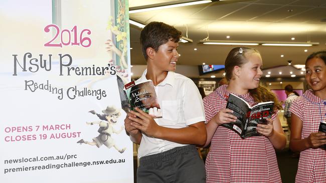 L to R: Andre Ferreira -11 , Gracie Lynch -11 and Gian from Tower street Public school , Panania. Launch of the Premier's Reading Challenge. Picture: John Appleyard