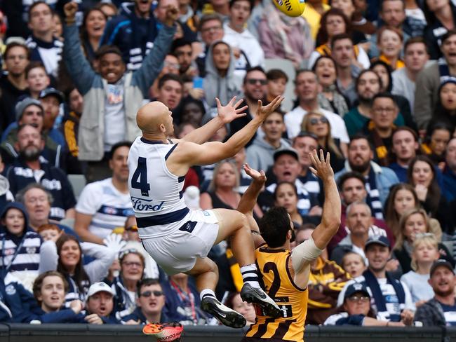 Gary Ablett takes a screamer over David Mirra. Picture: AFL Photos