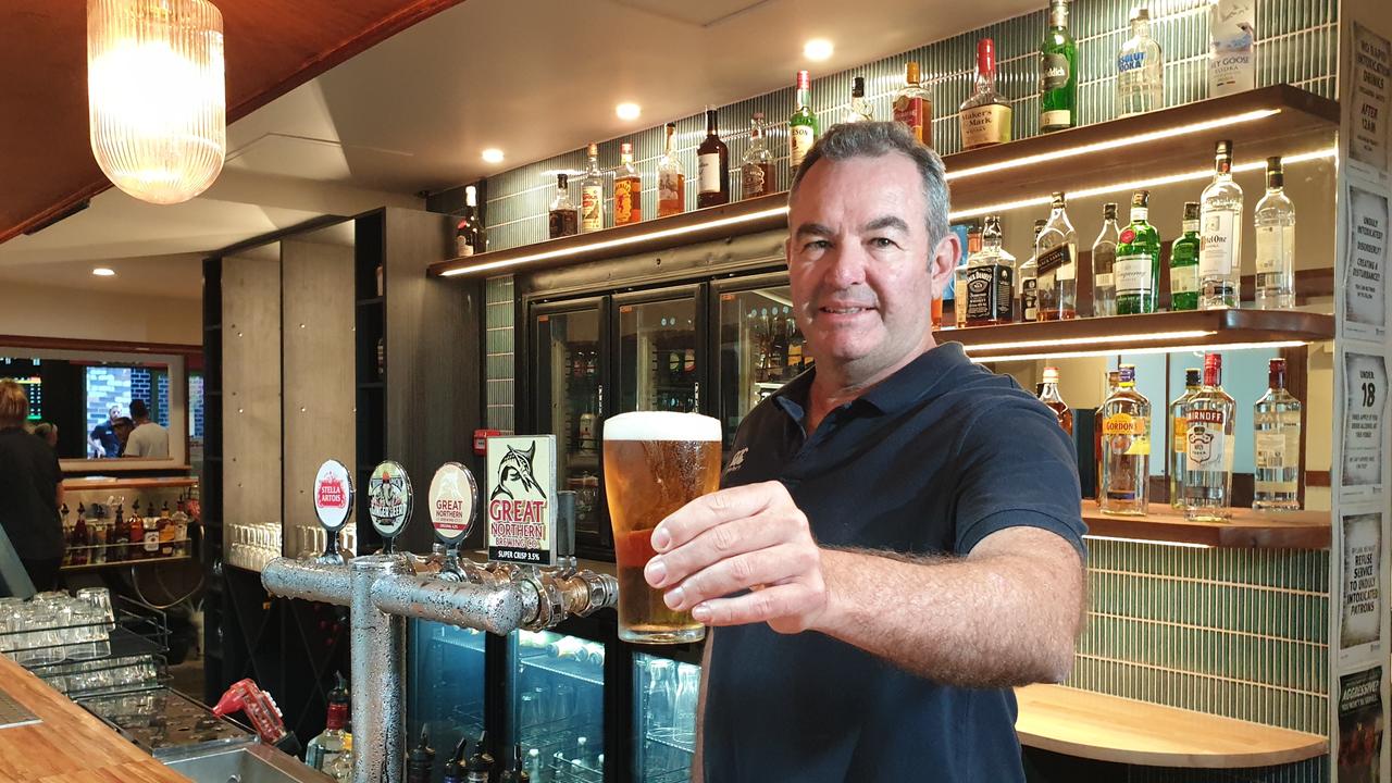 Duporth Tavern owner Clayton Williams pouring the first beer to celebrate the venue's $2.5 million revamp.