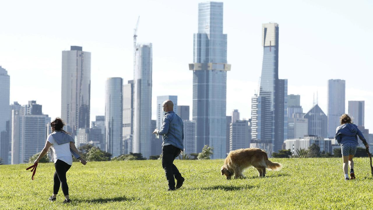 People exercising at Albert Park Lake in Melbourne within 5km of their home. Picture: NCA NewsWire / Daniel Pockett