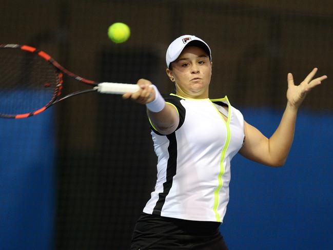 SPORT - Australian tennis player Ashleigh Barty, playing at the Perth Tennis International #1 at the State Tennis Centre in Burswood, paired with Jessica Moore in the doubles. Photo by Daniel Wilkins