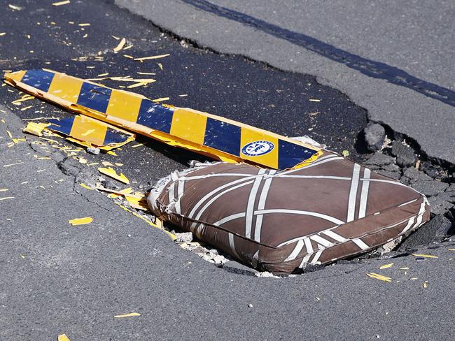 A giant pothole in Epping that has been filled with a couch cushion. Picture: Sam Ruttyn