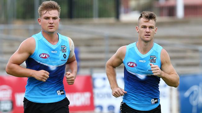 Robbie Gray (right) trains with Ollie Wines ahead of his comeback game. Picture: Sarah Reed