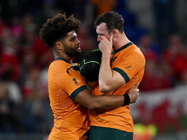 LYON, FRANCE - SEPTEMBER 24: Rob Valetini consoles Nick Frost of Australia at full-time following the Rugby World Cup France 2023 match between Wales and Australia at Parc Olympique on September 24, 2023 in Lyon, France. (Photo by Hannah Peters/Getty Images)