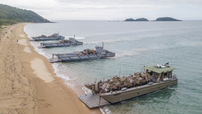 Australian Army LCM-8 Landing Craft and Royal Australian Navy LHD Landing Crafts carry M1A1 Abrams Main Battle Tanks, M113 Armoured Personnel Carriers and Australian Light Armoured Vehicles, during an amphibious beach assault, as part of Exercise Sea Explorer 2021. Picture: Department of Defence