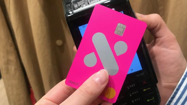 A customer using a neobank Xinja debit card. Picture: Supplied.