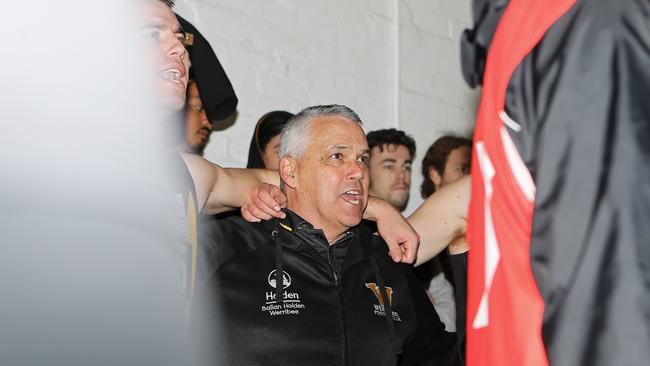 Mark Williams, while coaching Werribee, sings the club song after the 2019 VFL Elimination Final triumph against Box Hill. Picture: Martin Keep/AFL Photos via Getty Images