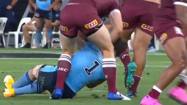 Queensland's Jai Arrow attacks a concussed James Tedesco. Picture supplied