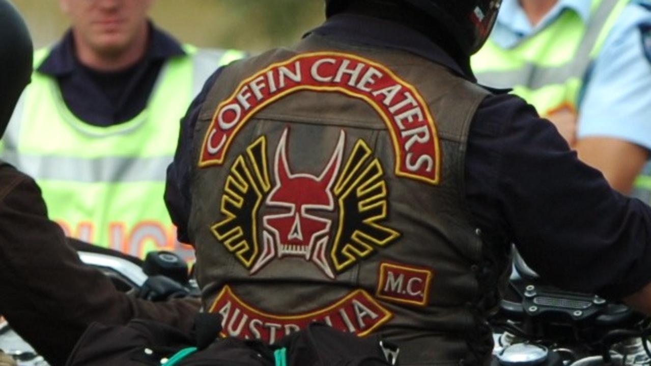 Coffin Cheaters bikie charged with extortion, assault after