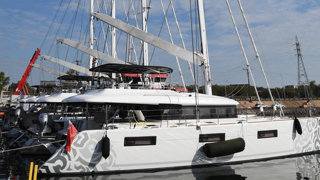 Superyachts spend millions of dollars to be cleaned and serviced in the Darwin. Picture: Katrina Bridgeford.