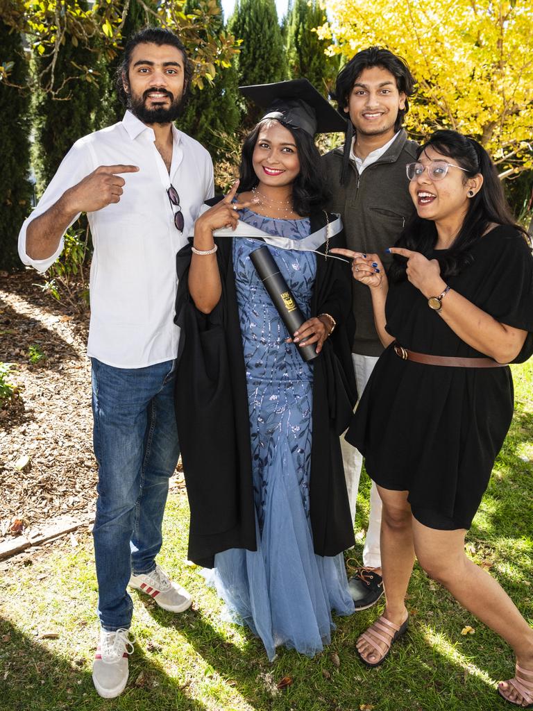 Master of Professional Accounting graduate Moumita Das celebrates her achievement with (from left) Karna Patel, Lahon Hossain and Krishna Ridham at a UniSQ graduation ceremony at Empire Theatres, Tuesday, June 27, 2023. Picture: Kevin Farmer