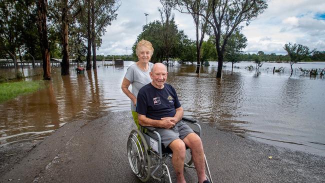 Eddie and Marie Van Vlemen from Camden looking at the floodwater near The Equestrian Park. Picture: Julian Andrews