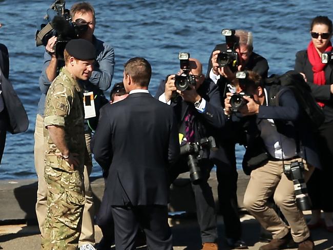 The Prince was greeted by Premier Mike Baird and a gang of waiting cameras Picture: Mark Metcalfe