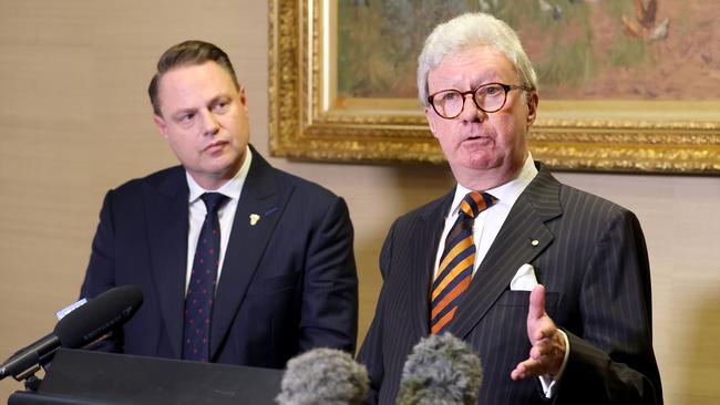 Lord Mayor Adrian Schrinner (left) and former Governor and Supreme Court chief justice Paul de Jersey at the release of Mr de Jersey’s review into the February flood. Picture: Steve Pohlner