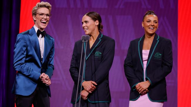 Brihony Dawson interviews Jasmine Garner and Ebony Marinoff after being named captain and vice-captain respectively. Photo by Dylan Burns/AFL Photos via Getty Images