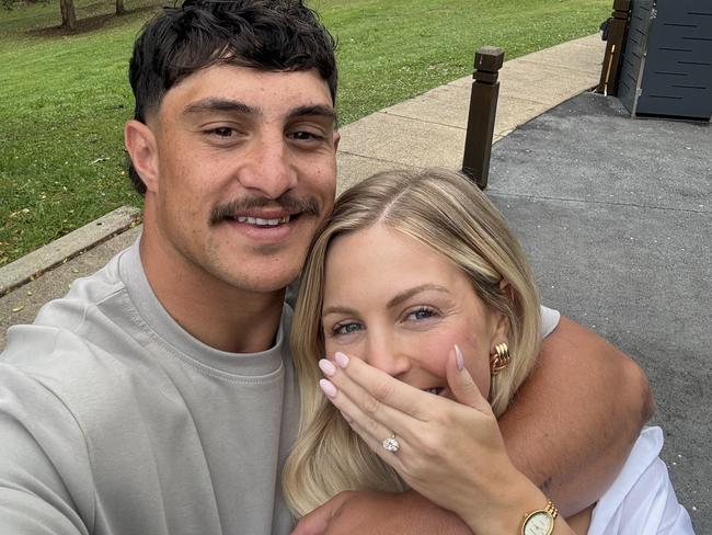 Brisbane Broncos star Kotoni Staggs and his fiancee Brittany Becht show off the ring after their engagement. Picture: Supplied/Kotoni Staggs