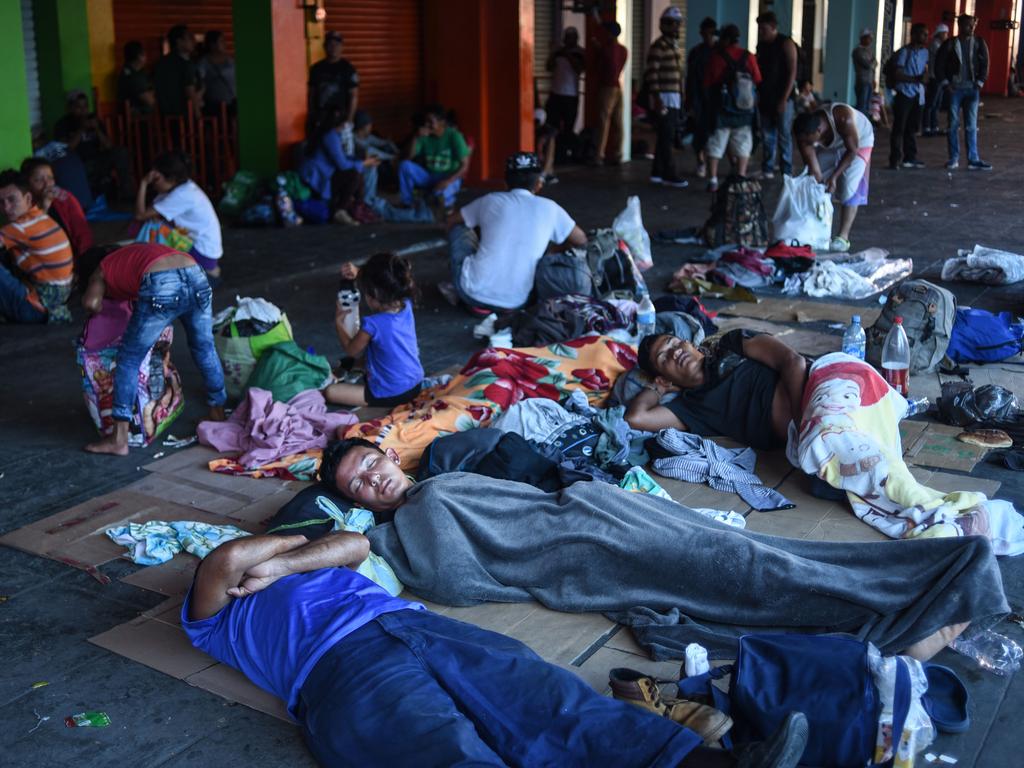Honduran migrants taking part in a caravan heading to the US, rest at the main square in Tapachula, Chiapas state, Mexico, on October 22, 2018. Picture: AFP)