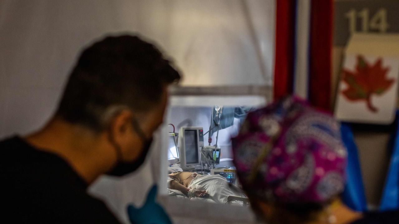 A doctor and nurse attend to a COVID-19 patient in an temporary Intensive Care Unit in California. Picture: AFP