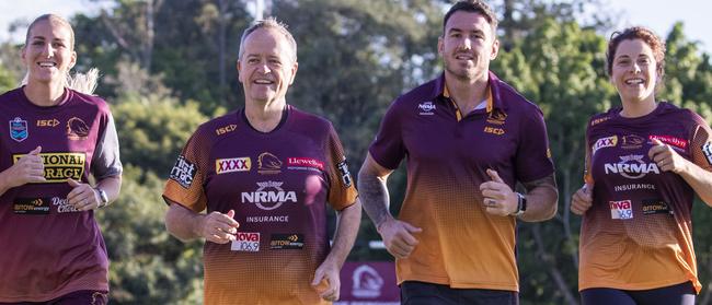  Bill Shorten and Labor candidate for Lilley Anika Wells (right) are seen with Brisbane Broncos players Ali Brigginshaw, and Darius Boyd during a morning run at the Clive Berghofer Centre in Brisbane. Picture; AAP. 