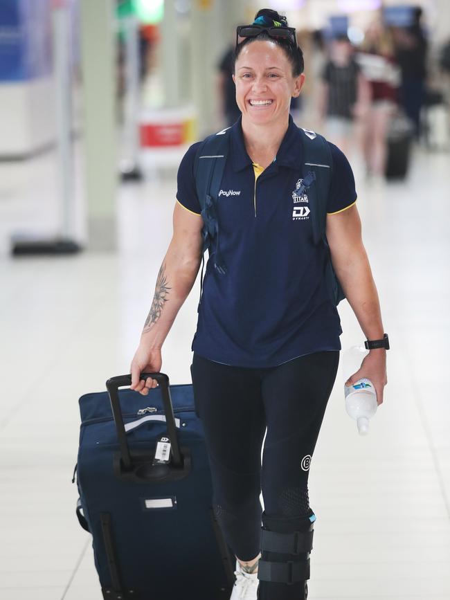 Players from the Titans NRLW team at Gold Coast Airport heading to Sydney to play in the NRLW grand final. The smiling assasins are ready to attack with their defence in the decider. Brittany Breayley-Nati in a moon boot... Picture Glenn Hampson