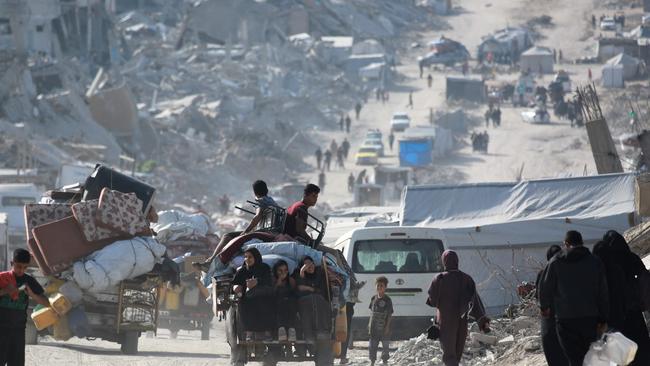 Palestinians move with their belongings through Jabalia as they flee the northern Gaza Strip. Picture: AFP.